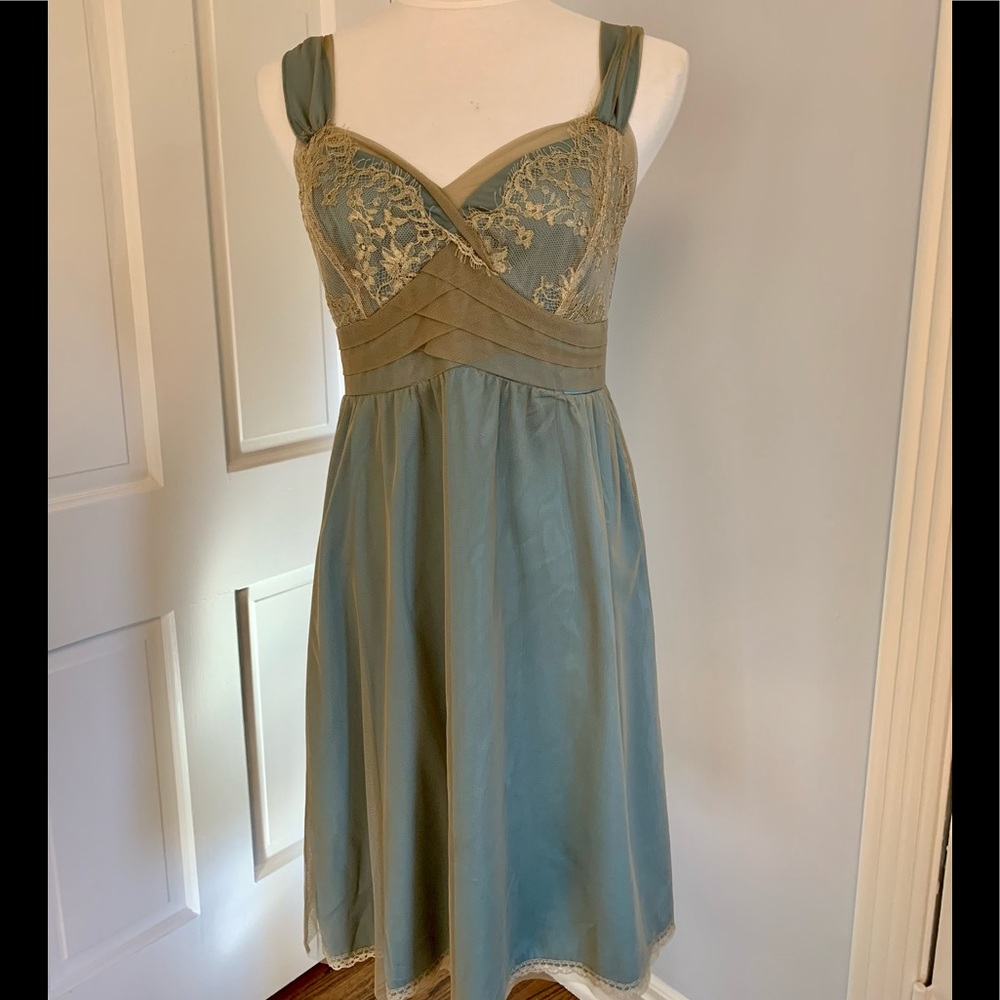 Cocktail dress with lace overlay